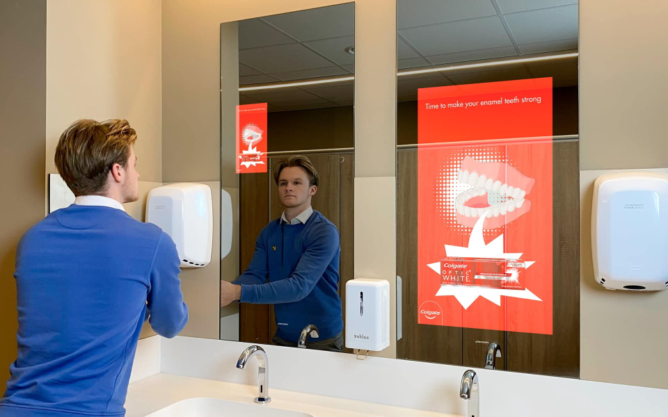 XPO Screens Narrowcasting Digital signage Invite XASTing DOOH Advertising Restroom media Smart mirror Colgate