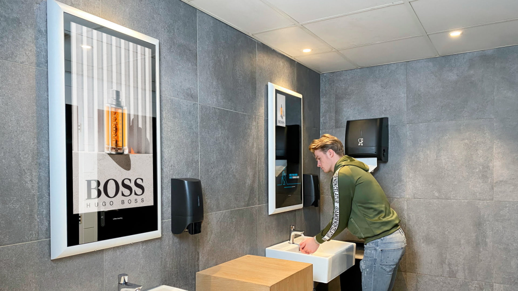 XPO Screens Narrowcasting Digital signage Invite XASTing DOOH Advertising Restroom media Smart mirrors Hugo Boss